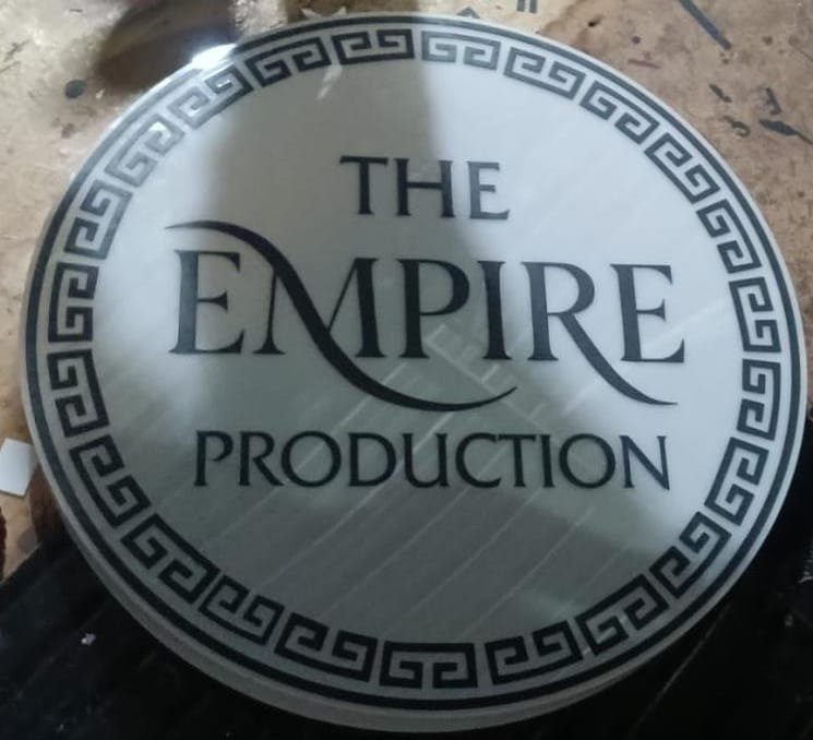 Round acrylic signboard for The Empire Production, opposite Bariatu Road, Ranchi — signage shop fabrication